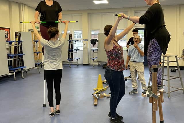 Stilt walking is just one of the new skills the whole STOS company are learning