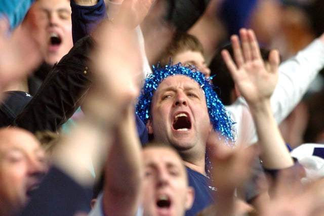 A Wednesday fan sports fancy headwear as 6,000 away fans descend on Derby County's Pride Park in May 2006.