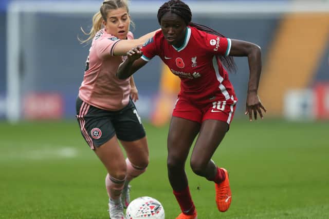 Rinsola Babajide of Liverpool gets away from Sophie Walton of Sheffield United during the Barclays FA Women's Championship match between Liverpool and Sheffield United (photo by Lewis Storey/Getty Images).