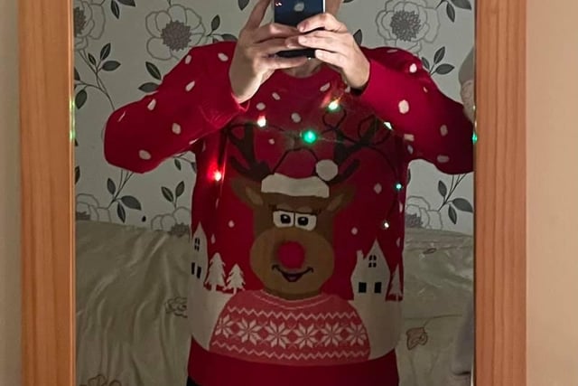 Mandy Morris has chosen a jumper complete with a reindeer design and lights.