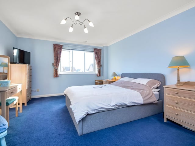 This four bedroom townhouse is on sale for £515,000 in Port Solent. It is listed by Fine and Country.
