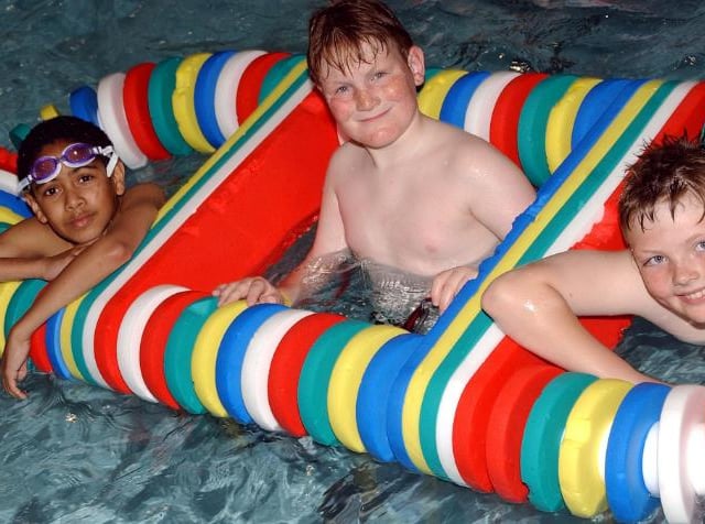 Three boys having fun at Adwick Leisure Centre's pool in 2005.