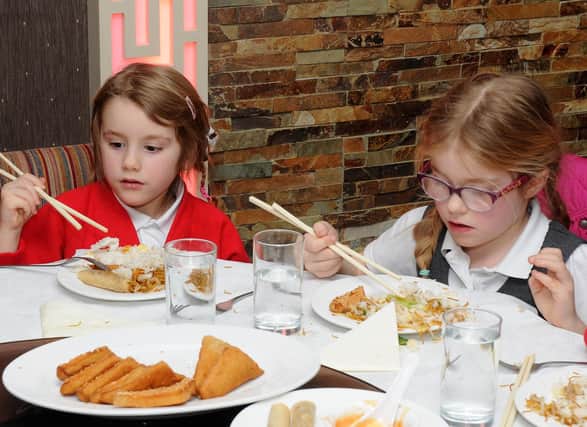 Schoolchildren trying a Chinese lunch at China Palace in Doncaster. Picture: Andrew Roe.