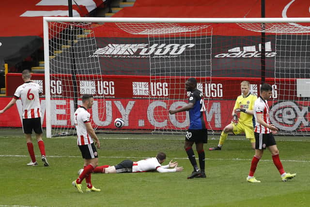 Sheffield United's players react after Ebere Eze put Crystal Palace 2-0 ahead at Bramall Lane: Darren Staples / Sportimage