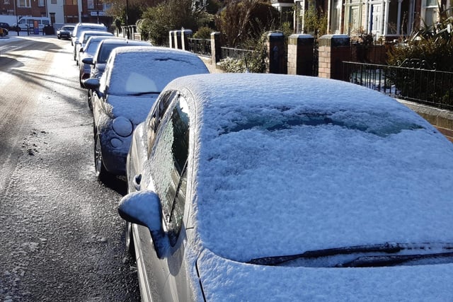 Cars in Roker Avenue are blanketed in snow