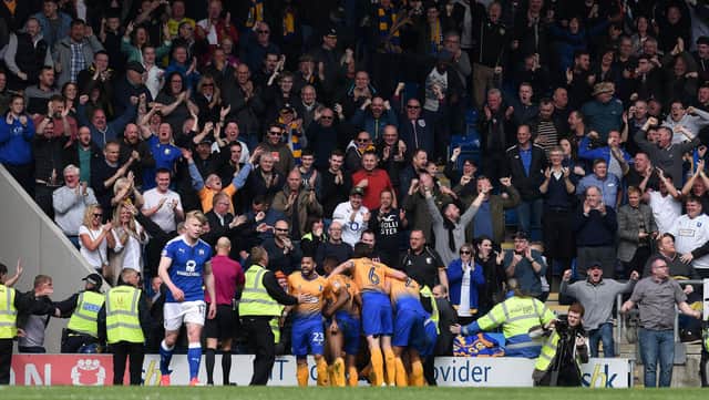 Picture Andrew Roe/AHPIX LTD, Football, EFL Sky Bet League Two, Chesterfield v Mansfield Town, Proact Stadium, 14/04/18, K.O 1pmMansfield's players celebrate Mal Benning's winning goalAndrew Roe>>>>>>>07826527594