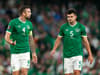 Sheffield United's John Egan requires treatment after Ireland's defeat to George Baldock and Greece