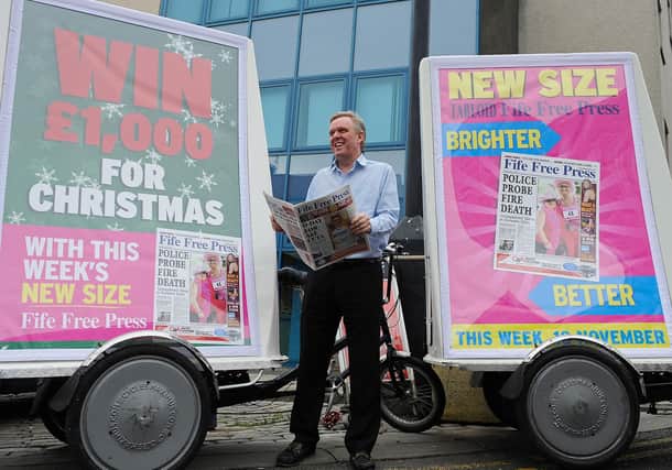 4710030 SSFF press bikes 
Fife Free Press Editor Allan Crow with the launch bicycles on the streets of Kirkcaldy