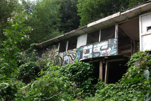 One of the pigeon lofts covered in graffiti