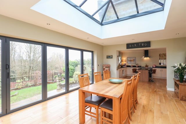 This is the open-plan living/dining space - it has a fully integrated breakfast kitchen with quartz worktops and the immediately eye-catching lantern roof.