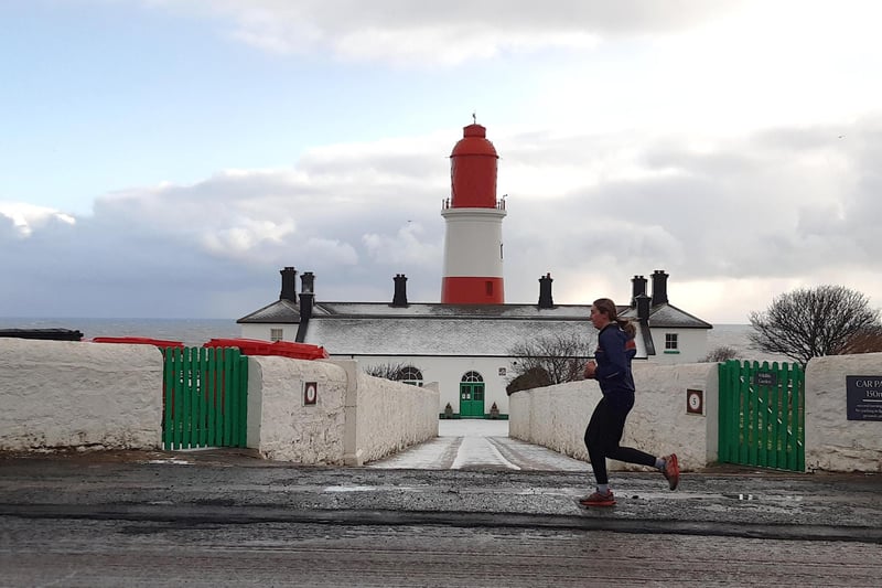 A runner braved the cold near Souter Lighthouse in South Shields.
