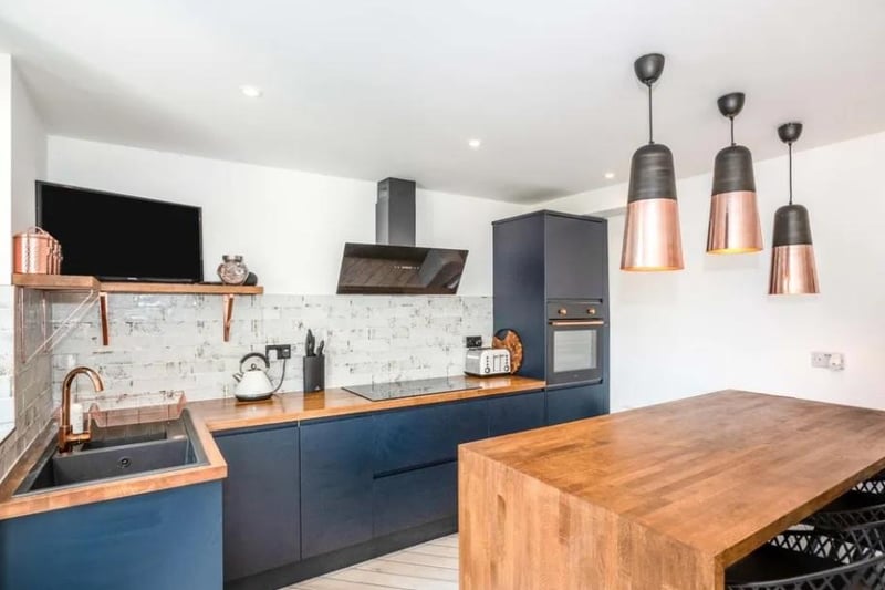 This three bed terraced house in Copnor Road, Portsmouth is on the market for £350,000. Here's what the kitchen looks like.