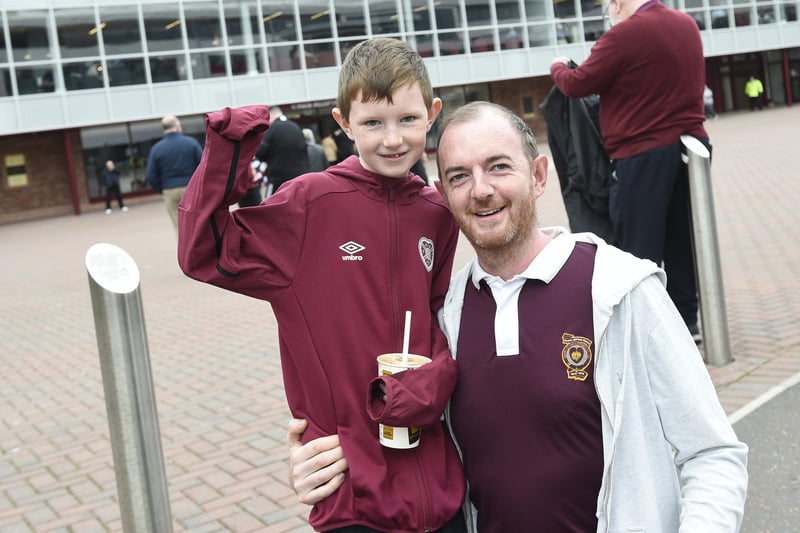 Russell Wilson with Lyle (8) ready to cheer on the Jambos