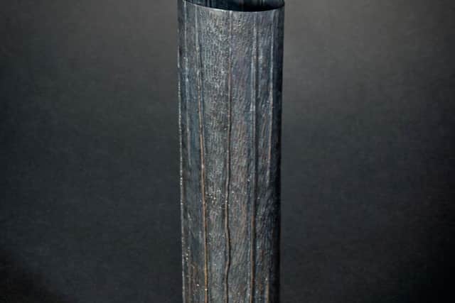 An example of Francisca Onumah’s work - Oxidised Copper Pleated Vase -