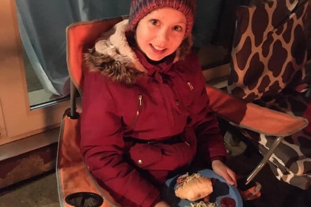 Jenny Elizabeth Carnall sent this photo of her daughter Lola enjoying a hotdog by the bonfire and watching the fireworks.