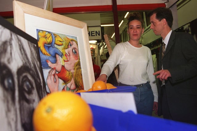 Sheffield Markets Publicity Officer Andrew Chappell discussed some of the art on show at Castle market with Event Co-organiser Kate Jacob back in 1998