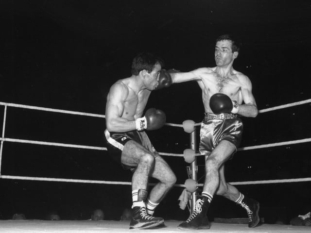 14th June 1966: Walter McGowan, (right), and Salvatore Burruni during their world flyweight championship at Wembley, London, which McGowan went on to win. (Photo by Central Press/Getty Images)
