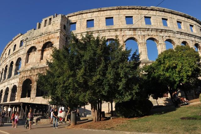 You can fly here from June 13. Pictured: Tourists explore the old Roman amphitheatre Arena in northern Croatian Adriatic town of Pula.