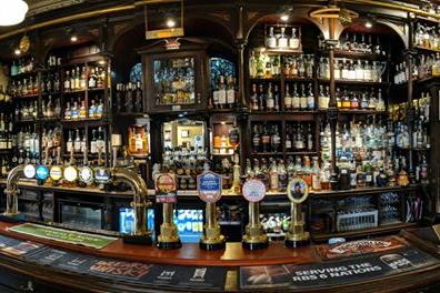 A) The Old College Bar
B) The Pot Still (pictured) 
C) Rab Ha's
D) The Saracen Head