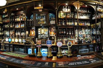 A) The Old College Bar
B) The Pot Still (pictured)
C) Rab Ha's
D) The Saracen Head