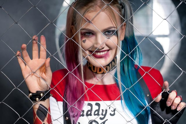 Get the look of Suicide Squad’s most popular character with some pigtails, messy blue and pink eye makeup, and red lipstick.