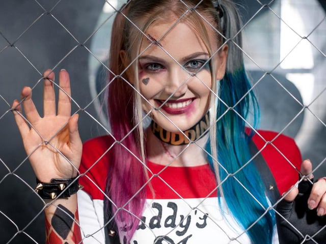 Get the look of Suicide Squad’s most popular character with some pigtails, messy blue and pink eye makeup, and red lipstick.