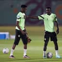 Senegal's Idrissa Gueye with Moussa N'Diaye (left) and Iliman Ndiaye (right) as Aliou Cisse's men prepare for their game against England: Martin Rickett/PA Wire.