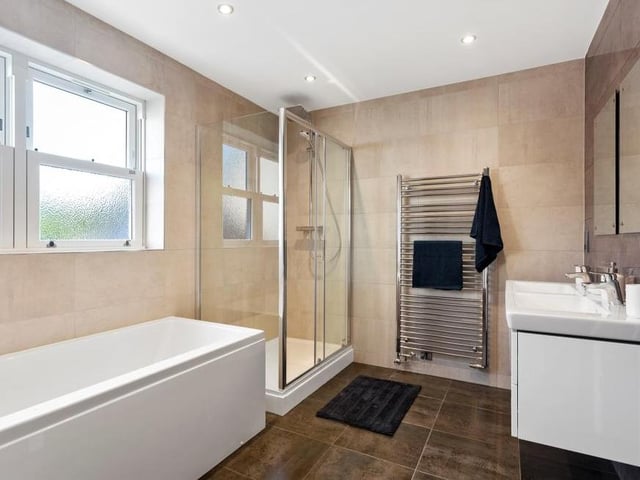 Another view of a typical bathroom. The modern design exemplifies the benefits of a brand new luxury build.