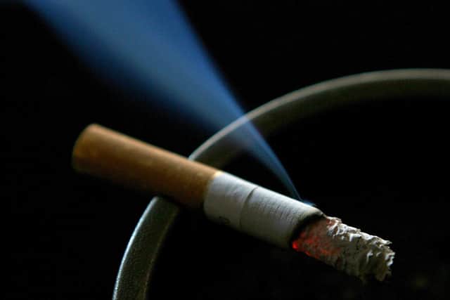 A cigarette burning on an ash tray. PRESS ASSOCIATION Photo. Picture date: Wednesday June 14, 2007. Photo credit should read: Gareth Fuller/PA.