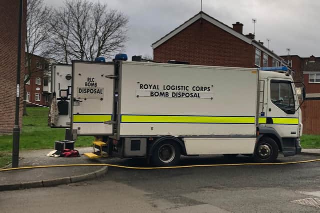 Bomb disposal vehicle parked outside the flats where the device was discovered.