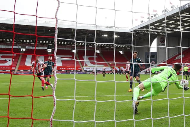Illan Meslier of Leeds United saves a shot by John Lundstram of Sheffield Utd: Simon Bellis/Sportimage