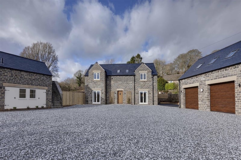 The newly built four-bedroom, detached country residence includes a detached one-bedroom barn, large hardstanding and a substantial double garage.