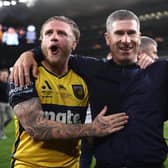 Former Sheffield United midfielder Nick Montgomery (C) celebrates with Jason Cummings (L) and Christian Theoharous (R) of the Mariners after winning the 2023 A-League Men's Grand Final: Cameron Spencer/Getty Images