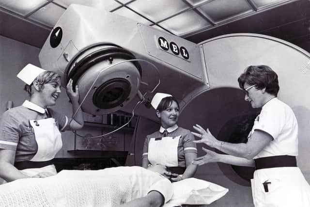 Much has changed since this five million volt linear accelerator was used at Weston Park Hospital in 1971. Pictured are enrolled nurses Nancy Oxlade (left) and Maureen O’Grady with superintendent radiographer, Mary Bradley.
