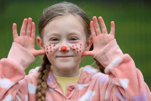 Celebrating Red Nose Day 2021 at Brook House Junior School in Beighton. Pictured is Rebecca Lister, 8. Picture: Chris Etchells