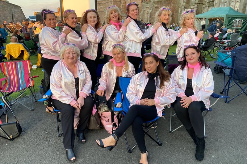 Eleven nurses from Ward 4 of Hexham General Hospital dressed as Pink Ladies for the screening of the musical movie Grease at Bamburgh Castle on Saturday, August 14, 2021.