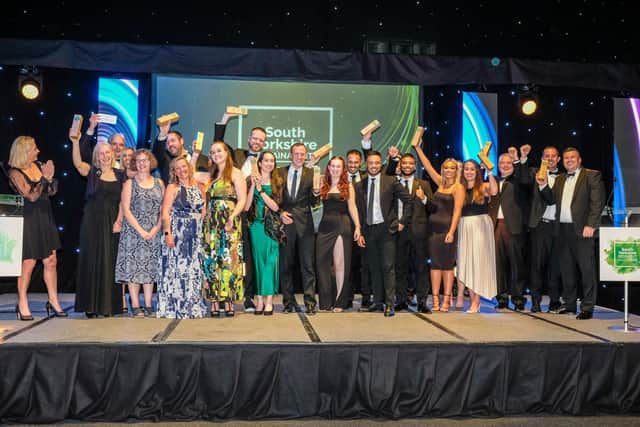 All the winners celebrate on stage at the South Yorkshire Sustainability Awards in 2022.