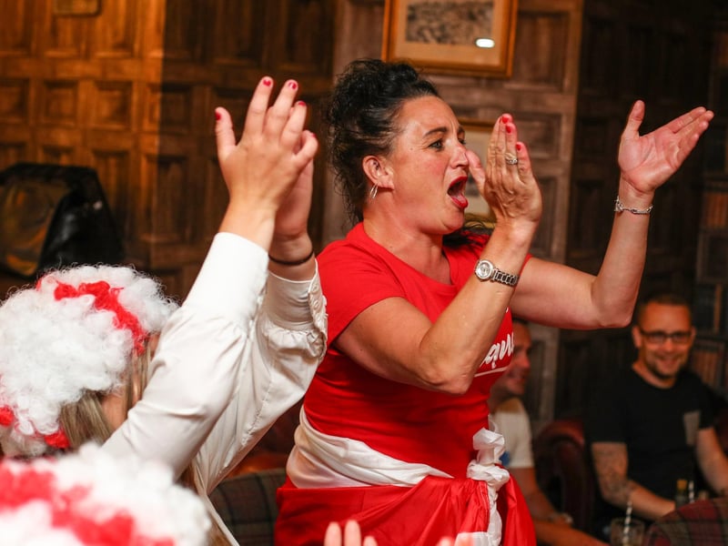 Fans pictured in The Kings pub celebrating as England score their second goal. Picture: Stuart Martin (220421-7042)