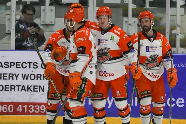 Steelers celebrate their win at Dundee on Sunday. (Derek Black)