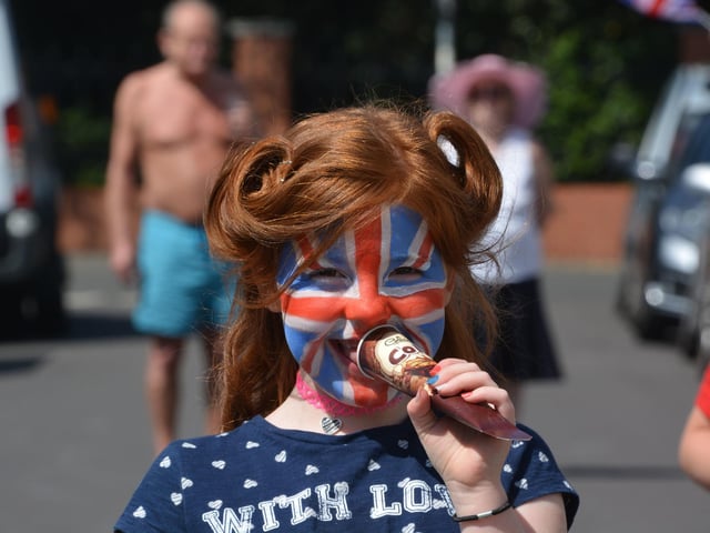 Laura Jeffrey, 7, with her face painted in Trevis Road, Southsea, at a socially-distanced street party to mark the 75th anniversary of VE Day.