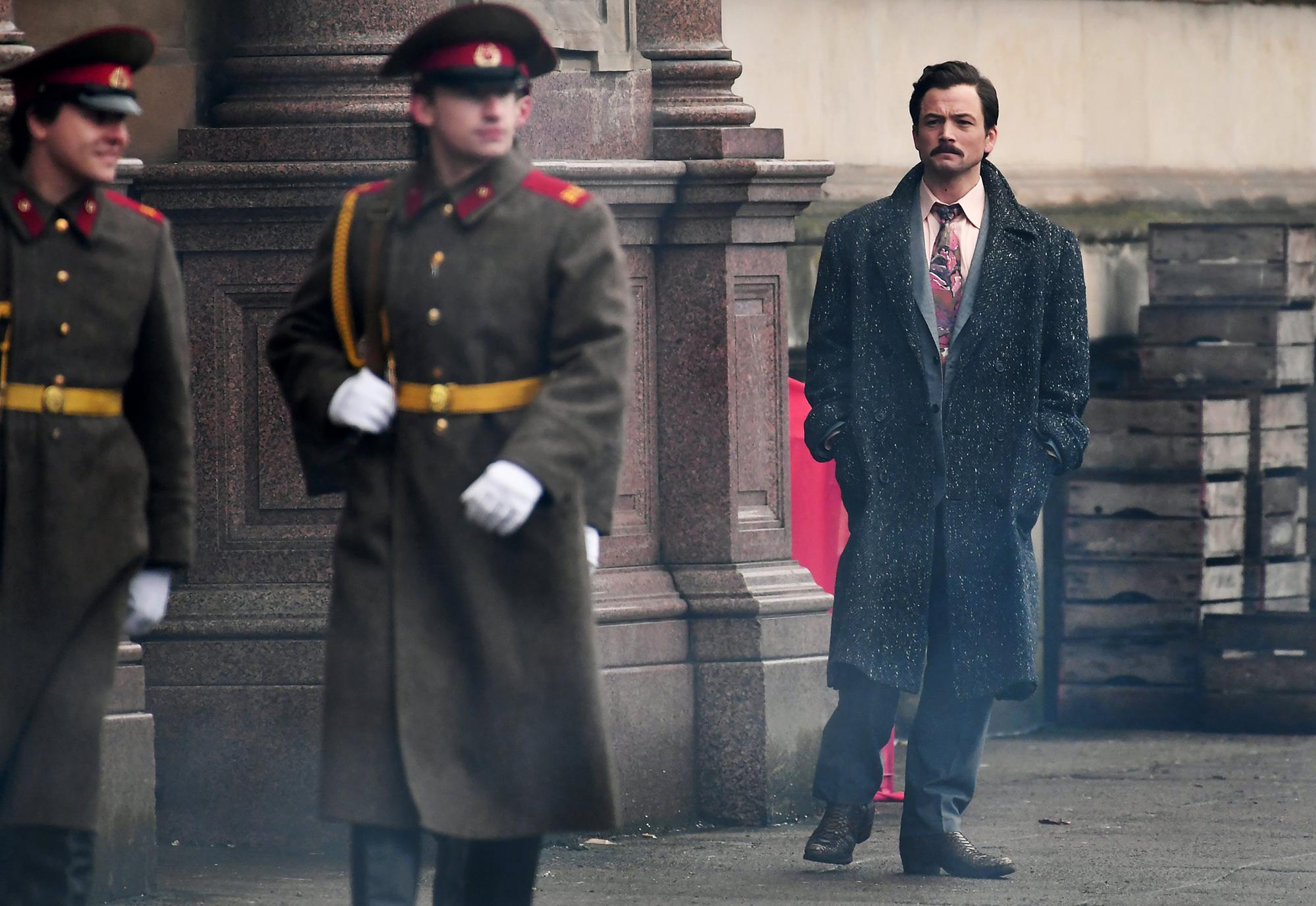 Taron Egerton sports a moustache during filming for Tetris in Glasgow