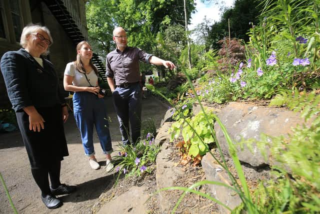 Baroness Bennett of Manor Castle officially opened the Percy Cane Rock Garden and Pocket Park at Broomhill Community Library on 17 June 2021. She is pictured with Emily and Nathan who designed the garden. Picture: Chris Etchells