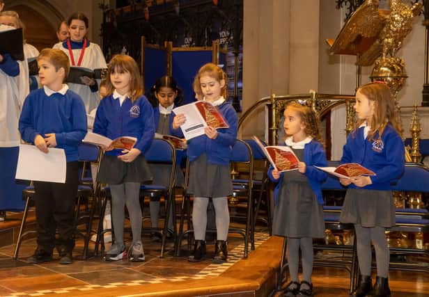 Locals gathered on Sunday afternoon at St Marys Church to take part in The News' Christmas Carol Service & Christingle, with readings from The News' Editor Mark Waldron and Pompey Manager Danny Cowley, along with Carols from local school children. Photos by Alex Shute