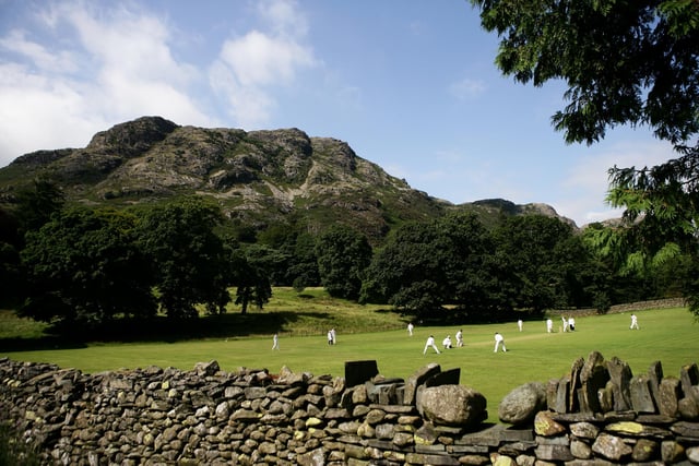 Here's a view of play at Keswick Cricket Club in the Lake District - Windermere, Coniston, Kendal and Ambleside are all much-loved towns and villages too.