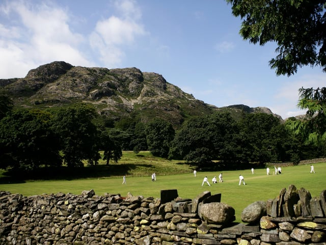 Here's a view of play at Keswick Cricket Club in the Lake District - Windermere, Coniston, Kendal and Ambleside are all much-loved towns and villages too.