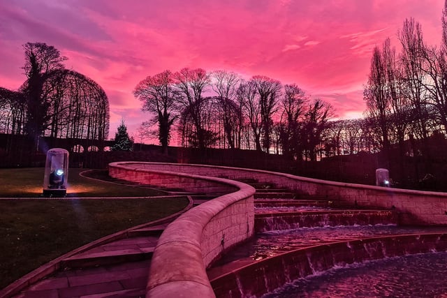 The evening cuts in at The Alnwick Garden.
