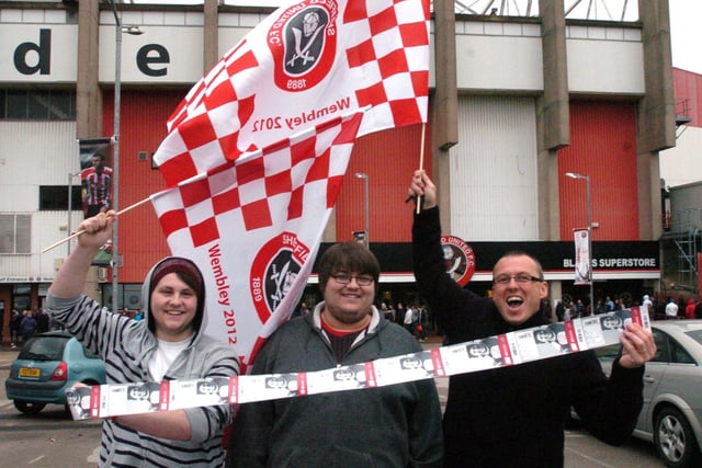 Kieron Greveson, Dave Greveson and Craig Thistlethwaite are all smiles after getting their tickets