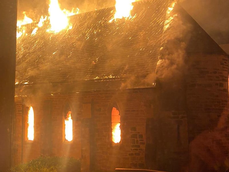 This images shows the roof still semi-intact before the blaze caused it to collapse in on itself.