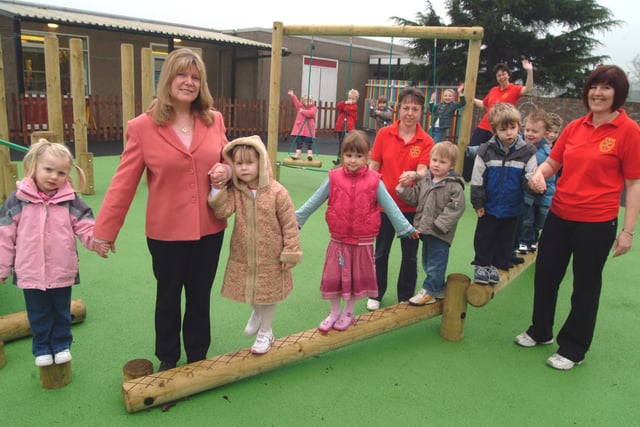 Mansfield St Peters C of E School Foundation Unit opened it's new outdoor play area in 2007 during a Bad Hair Day to raise funds for Marie Curie Cancer Care. Head Teacher Rosemary Wilson, left is pictured with youngsters and unit staff.