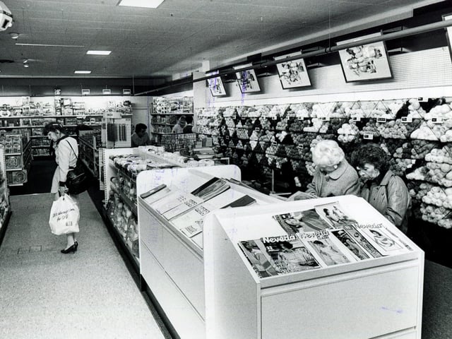 Browsing the knitting patterns in the Brightside & Carbrook Store, Castle House, Sheffield, in 1986